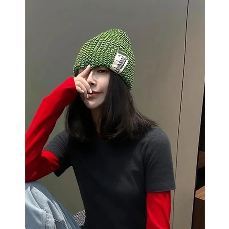 

Women's Short-Sleeve T-Shirt with Red Long-Sleeve Layered Design