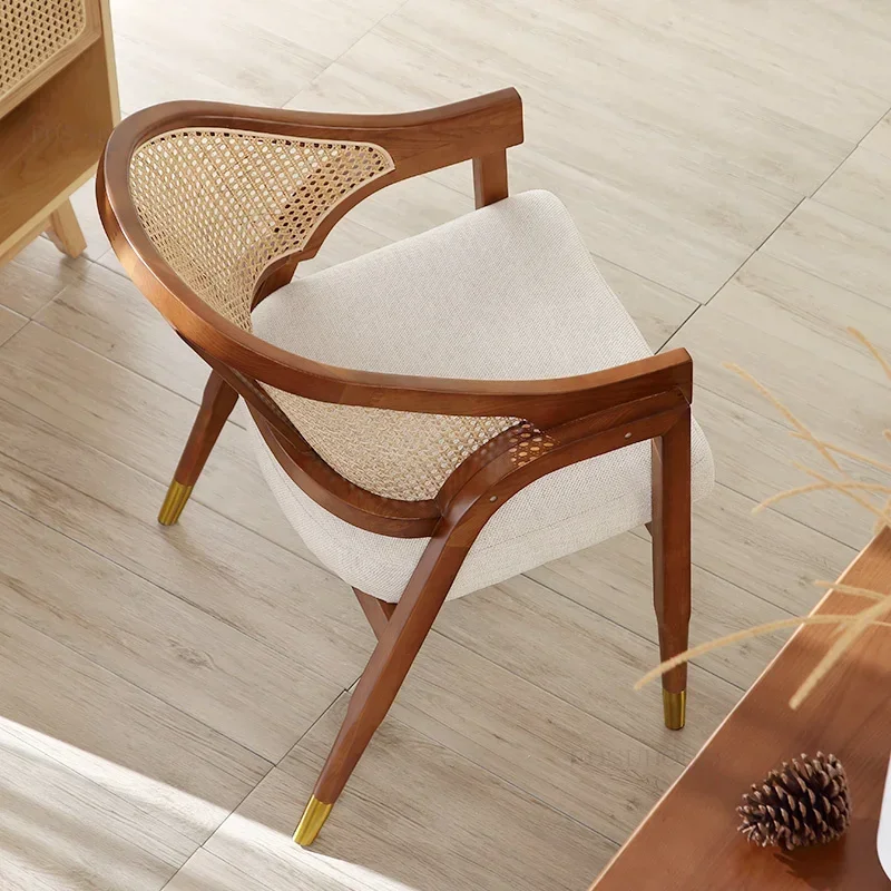 A Nordic Light Luxury Solid Wood Dining Armchair Modern Rattan Dining Chair Designer