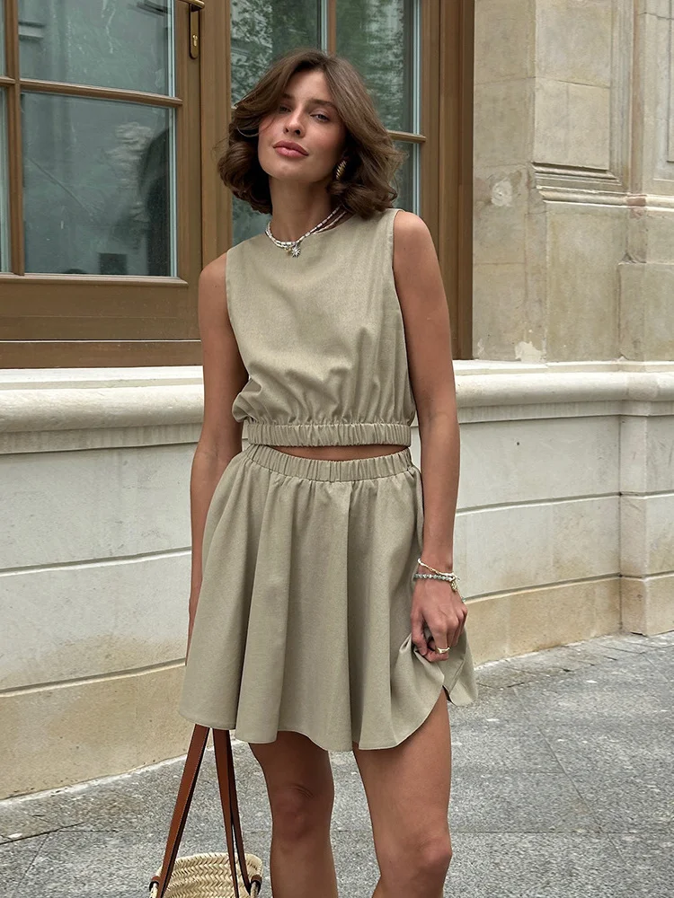 

Сексуальный комплект из топа с круглым вырезом и плиссированной юбки для женщин, модный ансамбль из весенней коллекции, классический стиль, содержание ткани 5%-70% [вставка данных о составе ткани, если применимо].