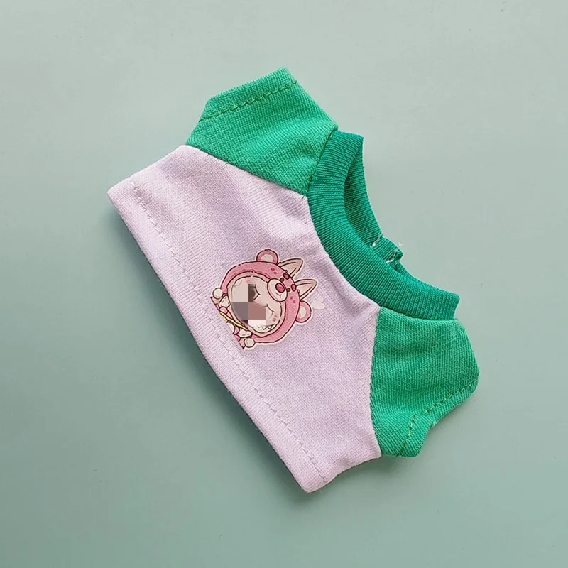 Jouets en peluche, sacs à vêtements, pendentifs, bretelles, T-shirts, personnages de dessins animés, peuvent être posés et tirés