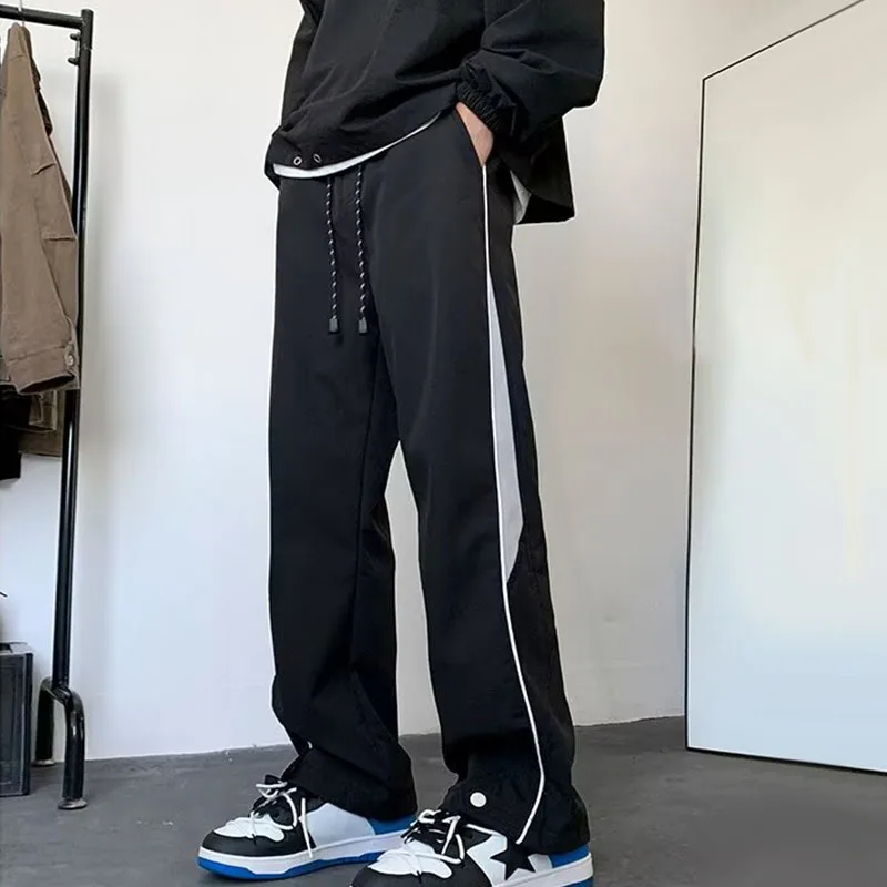 Celana panjang kasual wanita, bawahan Joger kasual tahan air 2024, musim semi musim gugur celana lurus longgar warna Solid tahan angin untuk lelaki