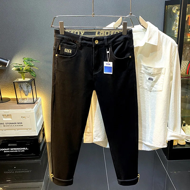 

Pure black high-end fashion brand jeans men's stretch pencil pants casual slim fit skinny handsome autumn and winter long pants