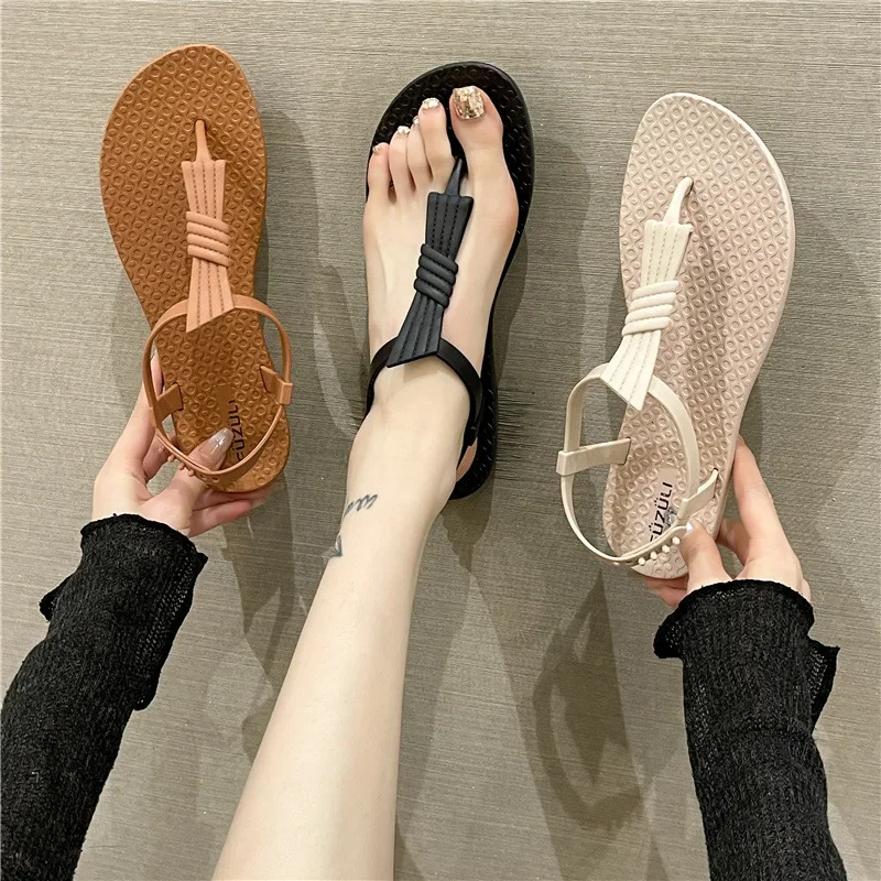 Sandalias de verano a la moda para mujer, zapatos informales blancos planos con correa con cordones de una pieza, prendas de vestir exteriores de playa para estudiantes