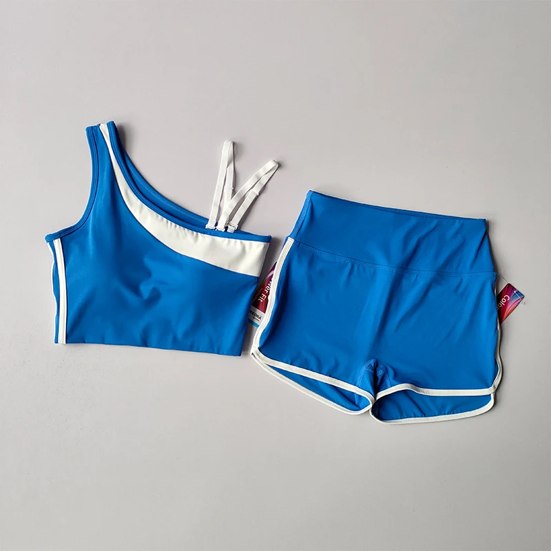 كوب ثابت من قطعة واحدة وأشرطة كتف مزدوجة واحدة للتبديل حمالة صدر رياضية عالية المقاومة للصدمات والجري والتدريب واللياقة البدنية مجموعة شورت