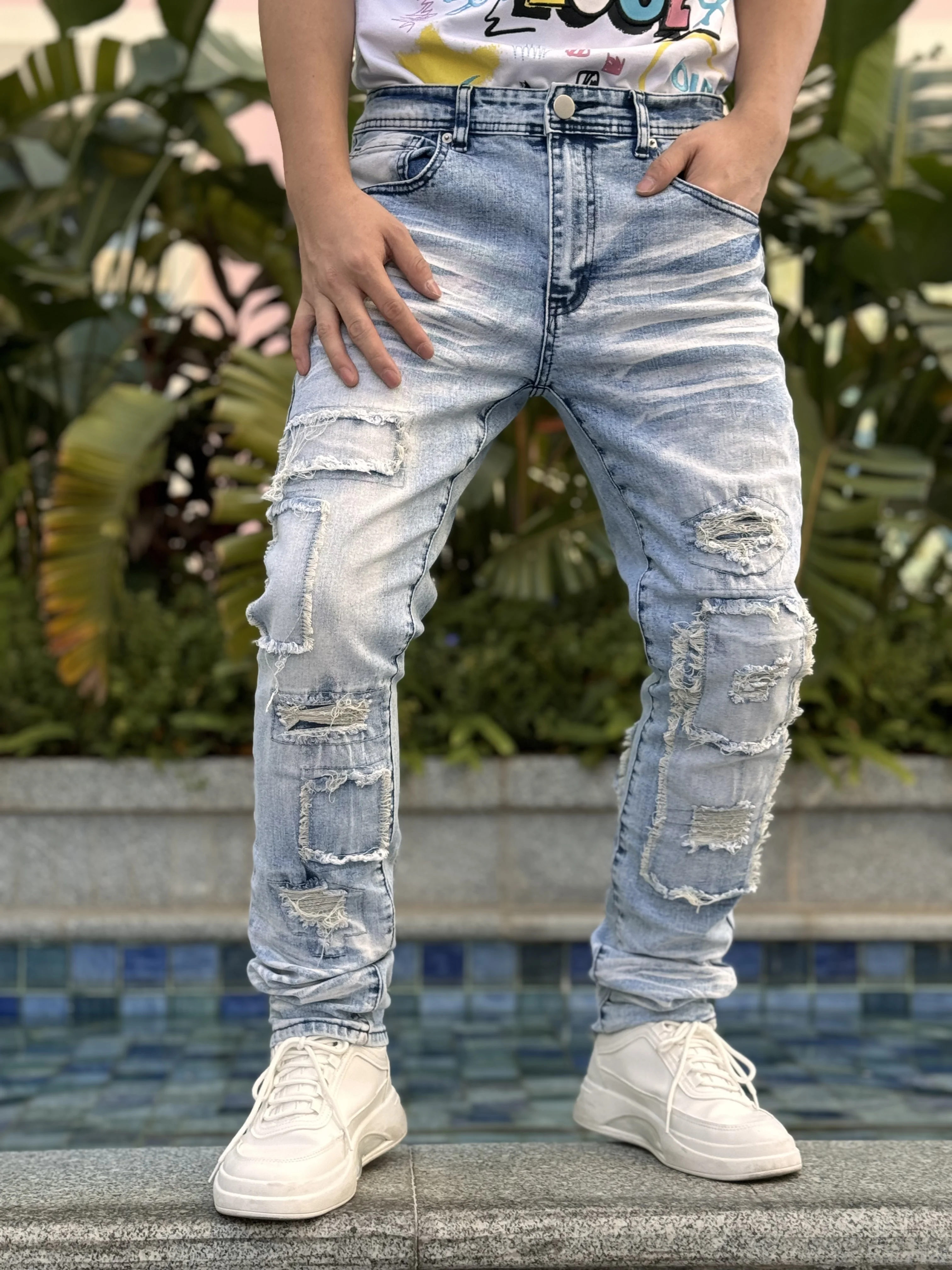 

Y2K men's distressed denim pants series features a fashionable and trendy style with regular cut and a blue cotton blend fabric