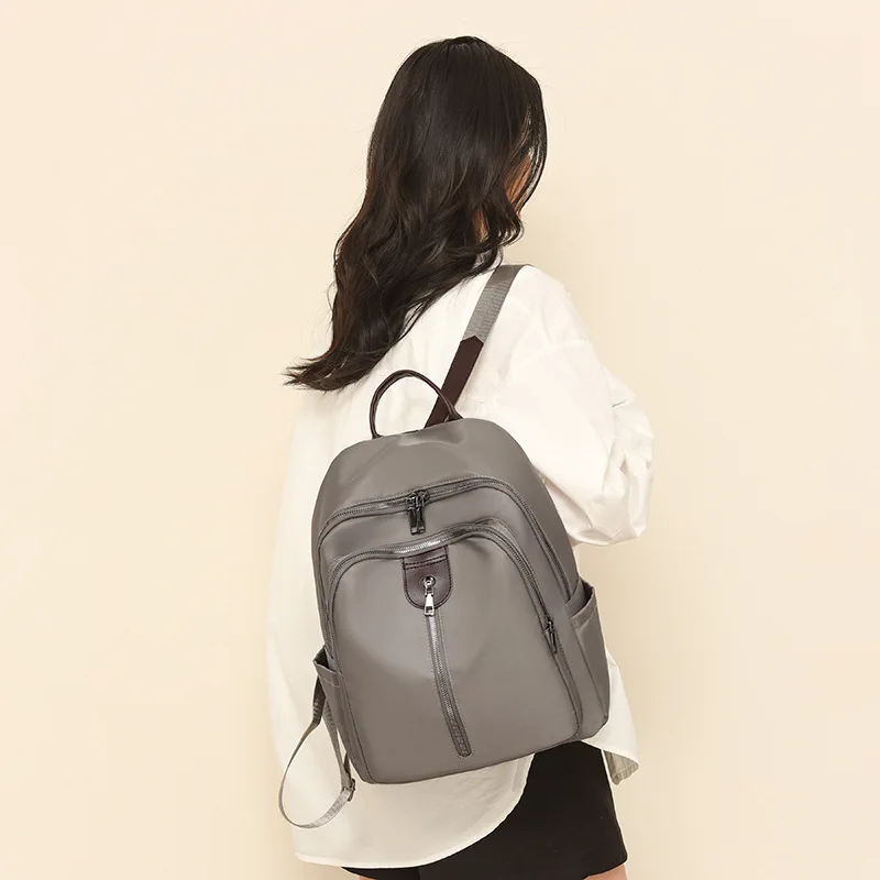 Wholesale of new nylon casual bags  travel schoolbags for women summer 2025 large capacity Oxford waterproof backpacks
