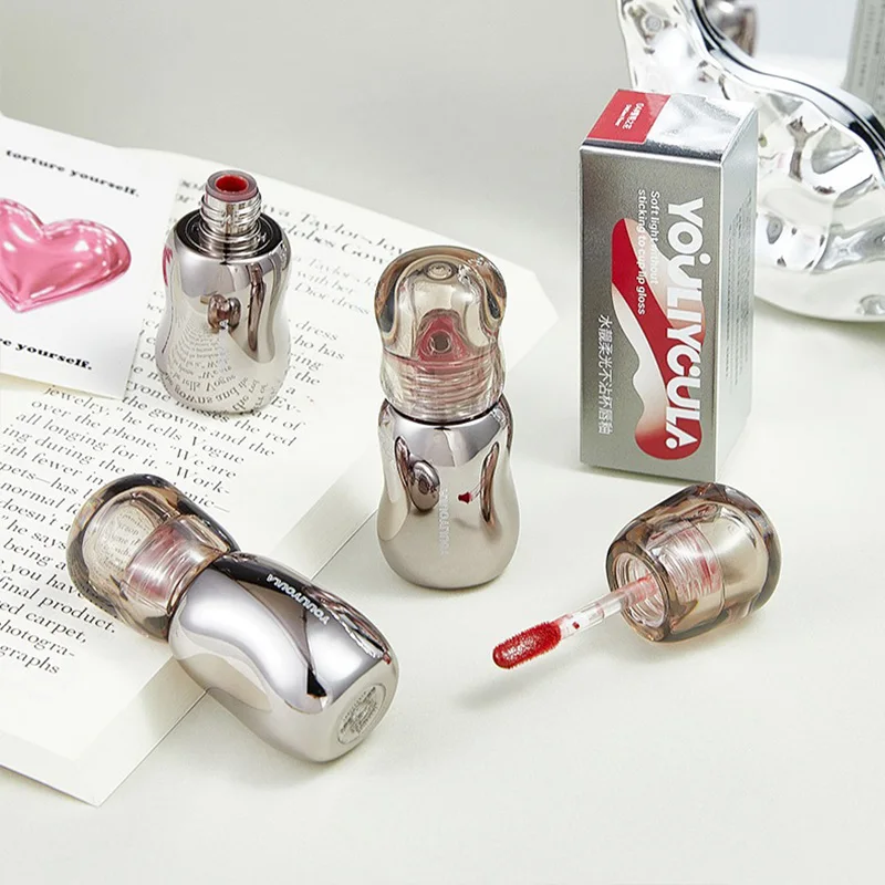 Shuiliang グロッシー リップ グロス: 美白効果のあるふっくらと光沢のある唇のための超保湿フォーミュラ - 学生に最適