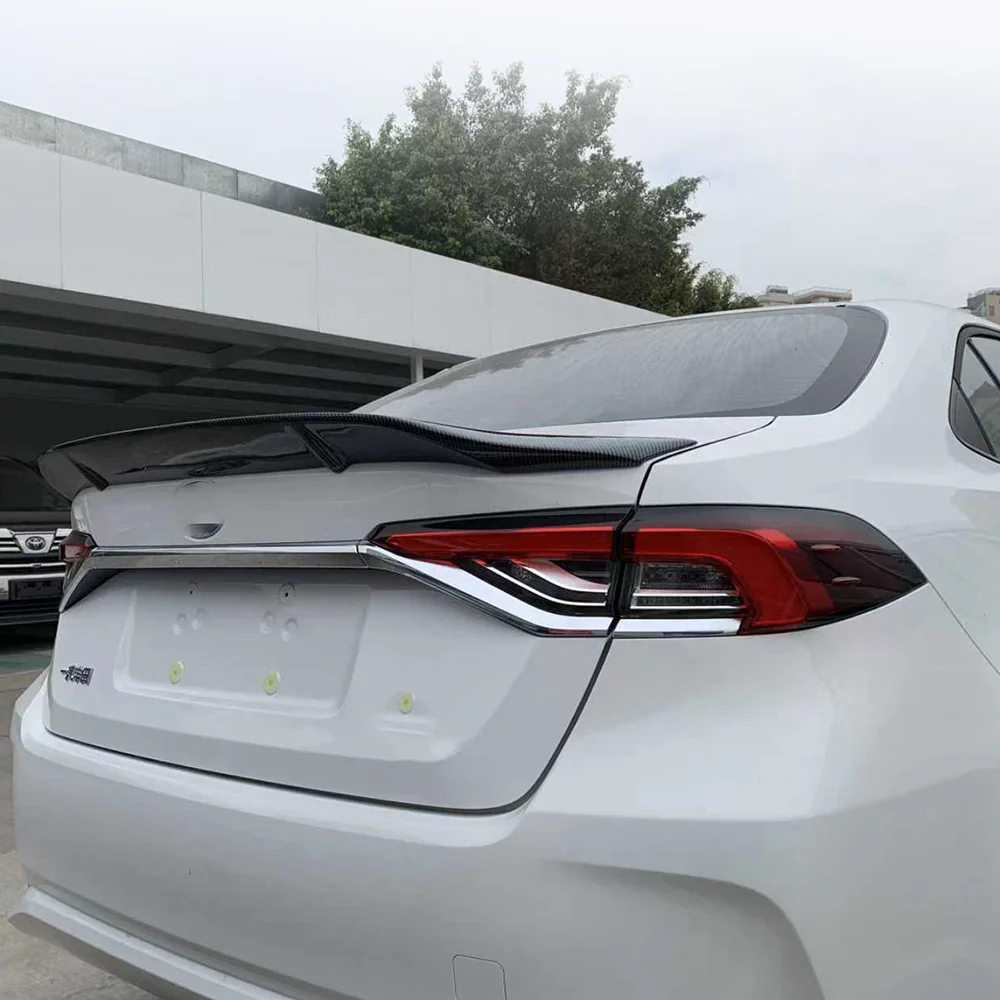 

Suitable for 19-22 Toyota Corolla sedan spoilers, fenders, rear tailgate, exterior components, rear spoilers, ABS material R mod