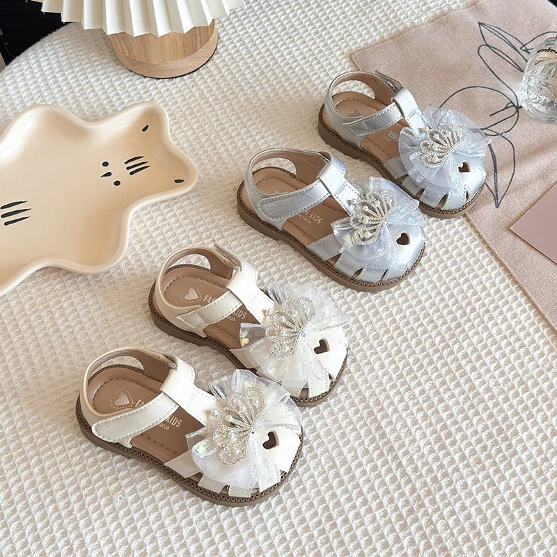 2026 New Summer Girls Bow Sandals Rhinestone Crown Children Dress Shoes School Wedding Party Kids Hollow-out Flat Sandals