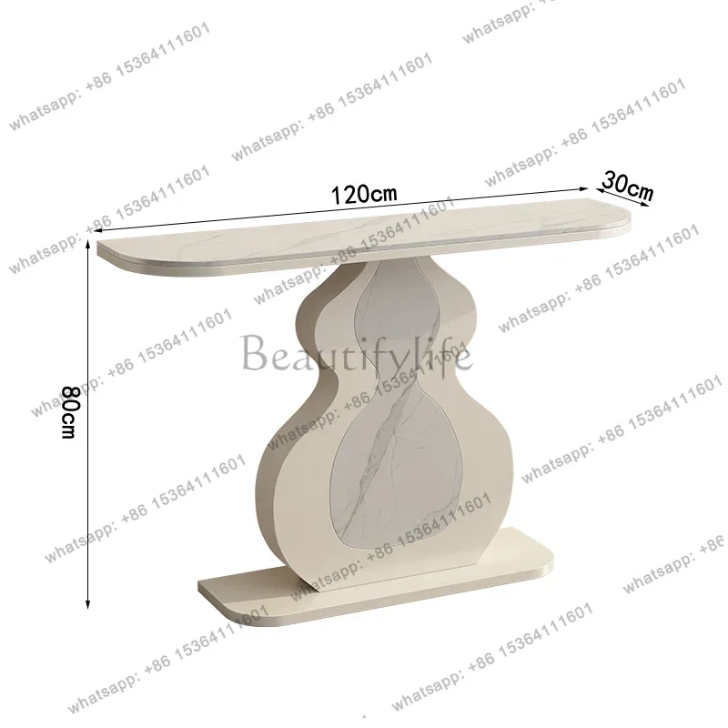modern simple rock slab entrance table is opposite the door cabinet corridor against the wall end view table