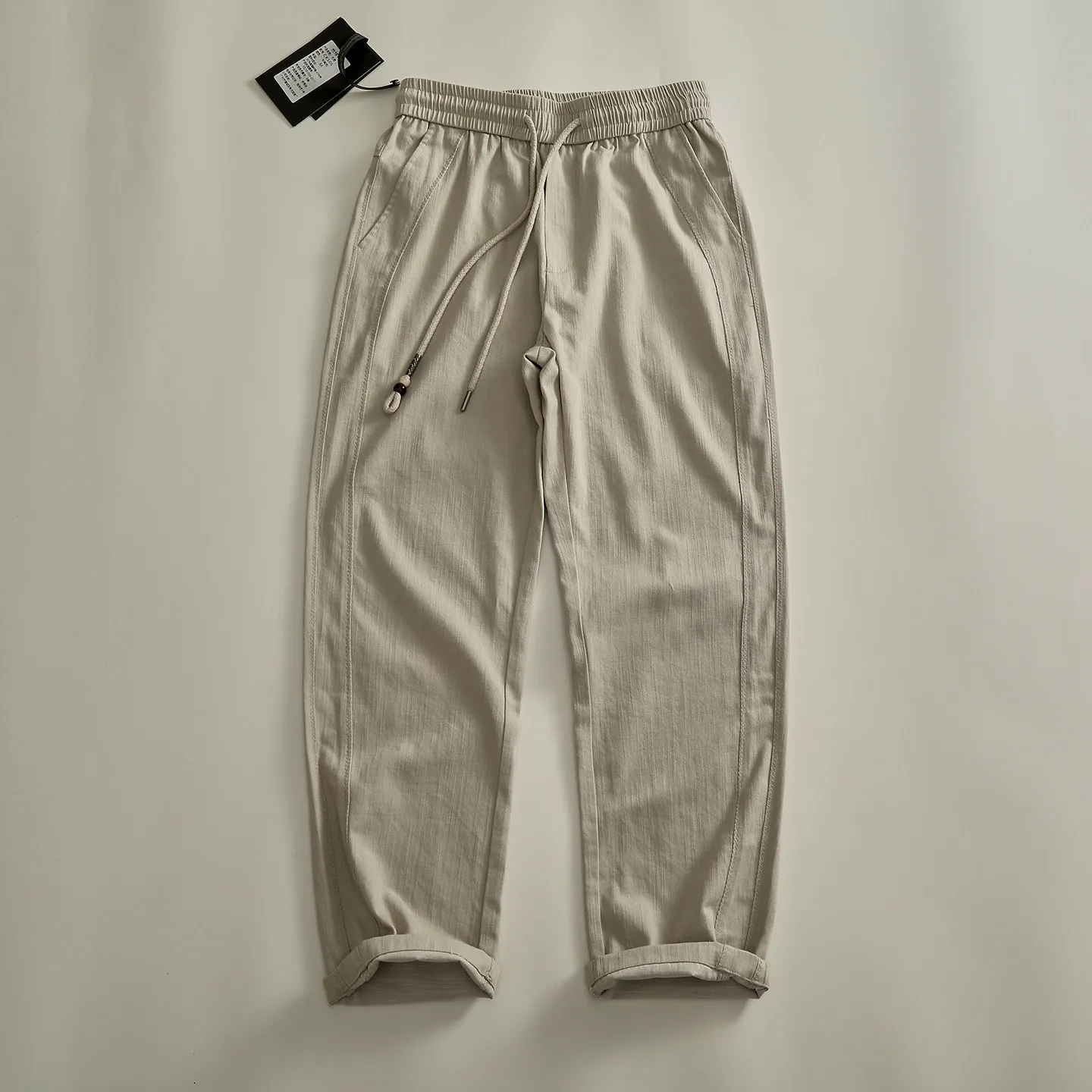 Men's drawstring casual pants, anti-wrinkle fabric, divided and pressed, loose tapered long pants