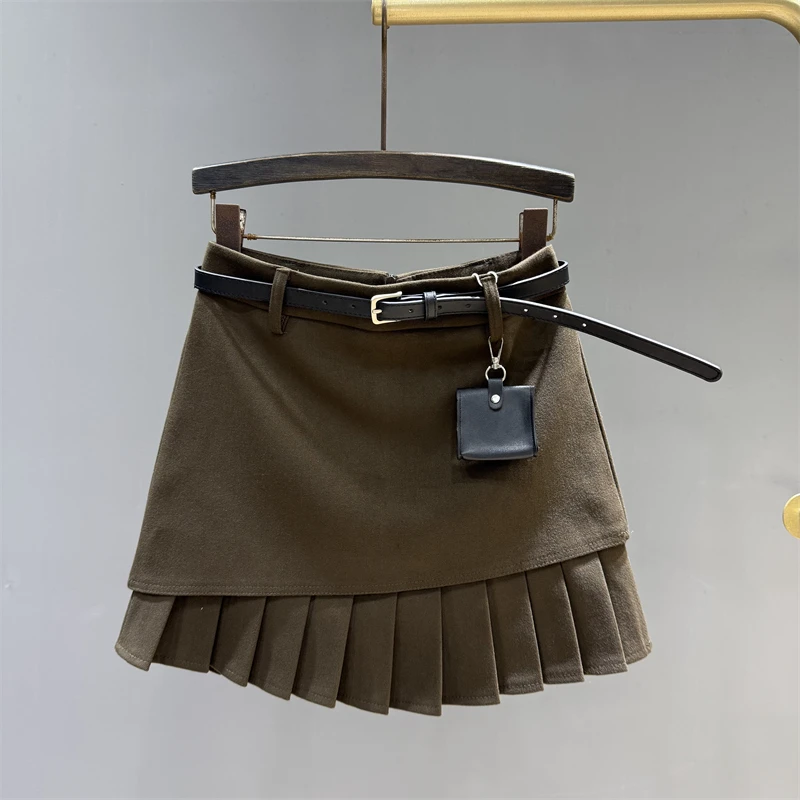 

Solid color versatile temperament woolen skirt women autumn 2025 new slimming and versatile A-line pleated short skirt