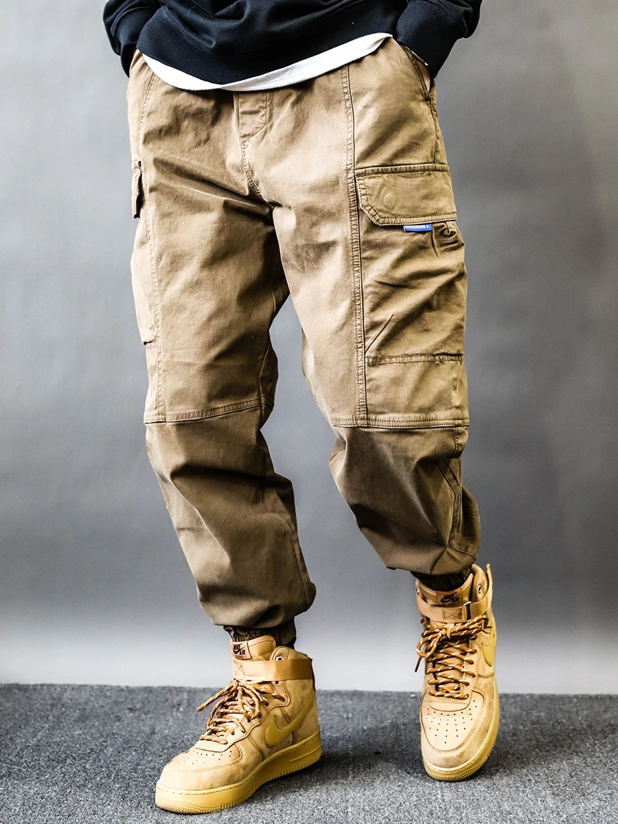 

Американские ретро-брюки с эффектом потертости, многокарманные, свободного кроя, в стиле Харлан, повседневные, весенние, модные, из чистого хлопка, однотонные, со средней посадкой, длинные