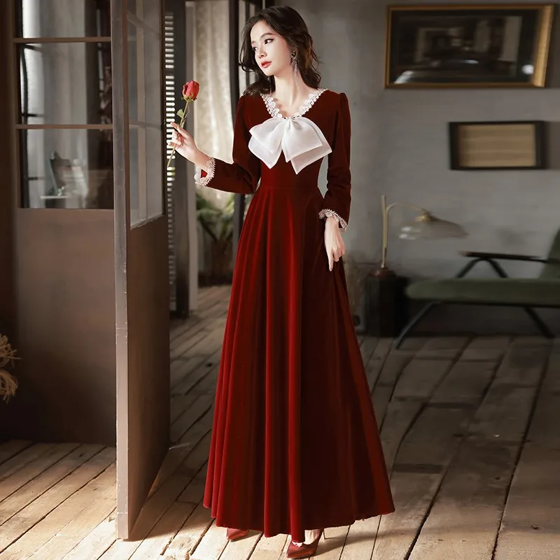 

A toast to the new Burgundy velvet dress