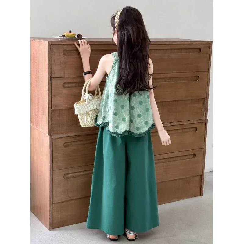 

Summer2026Girls' fashion set, new stylish two-piece outfit for girls, featuring a sleeveless shirt and wide-leg pants