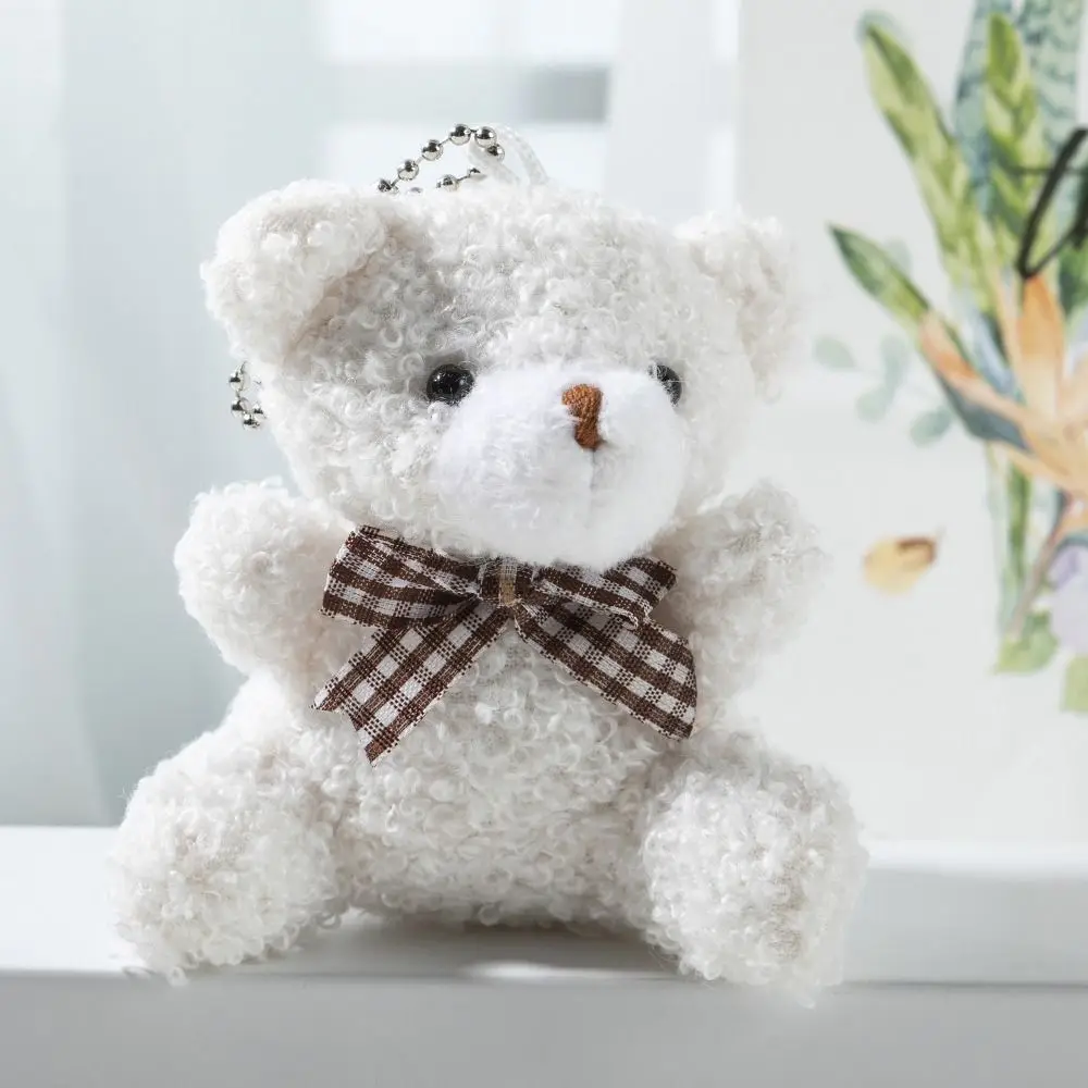 Llaveros de muñeco de oso con pajarita de dibujos animados Kawaii de 8CM, colgante de oso de peluche Multicolor, regalo suave, oso de peluche colgante Universal