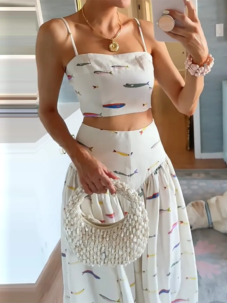 

New 2025 Fashion Hollow Sleeveless Sling 2pc Set Elegant Pleated Long Skirt Party Suit Lady Summer Pattern Printed Beach Outfit