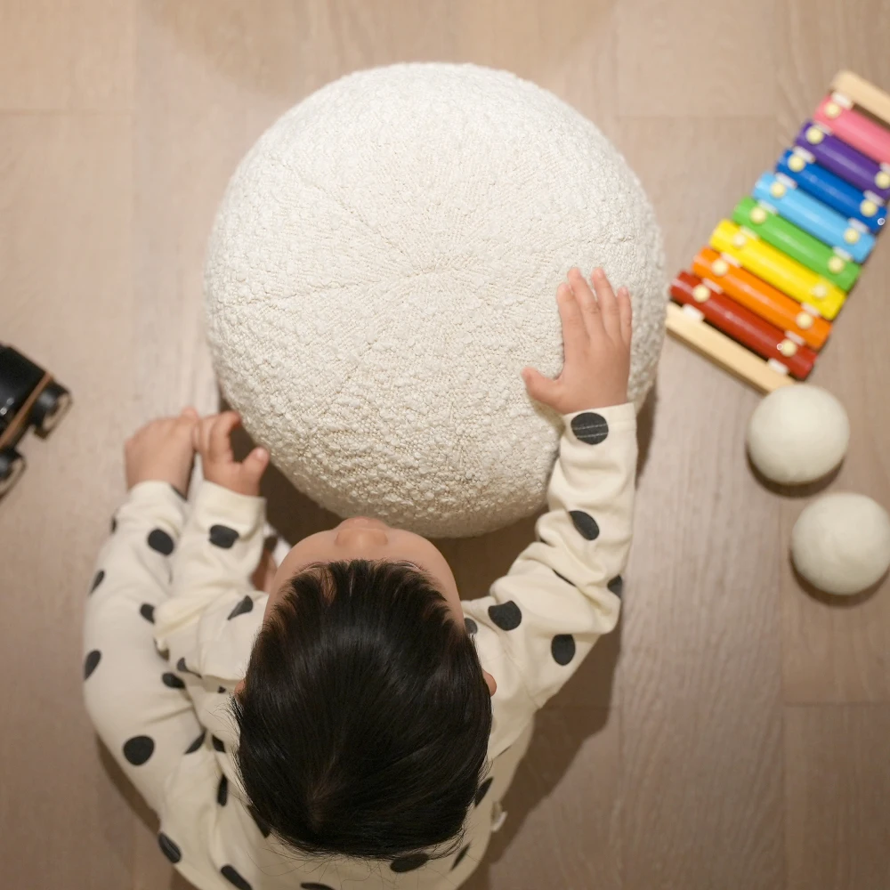 12-inch Round, Ivory-white Fleece Pom-pom Throw Pillow, Made of Premium Fleece and Polyester Fabric, Easy To Care for, Durable, and Perfectly Complements Various Interior Styles.