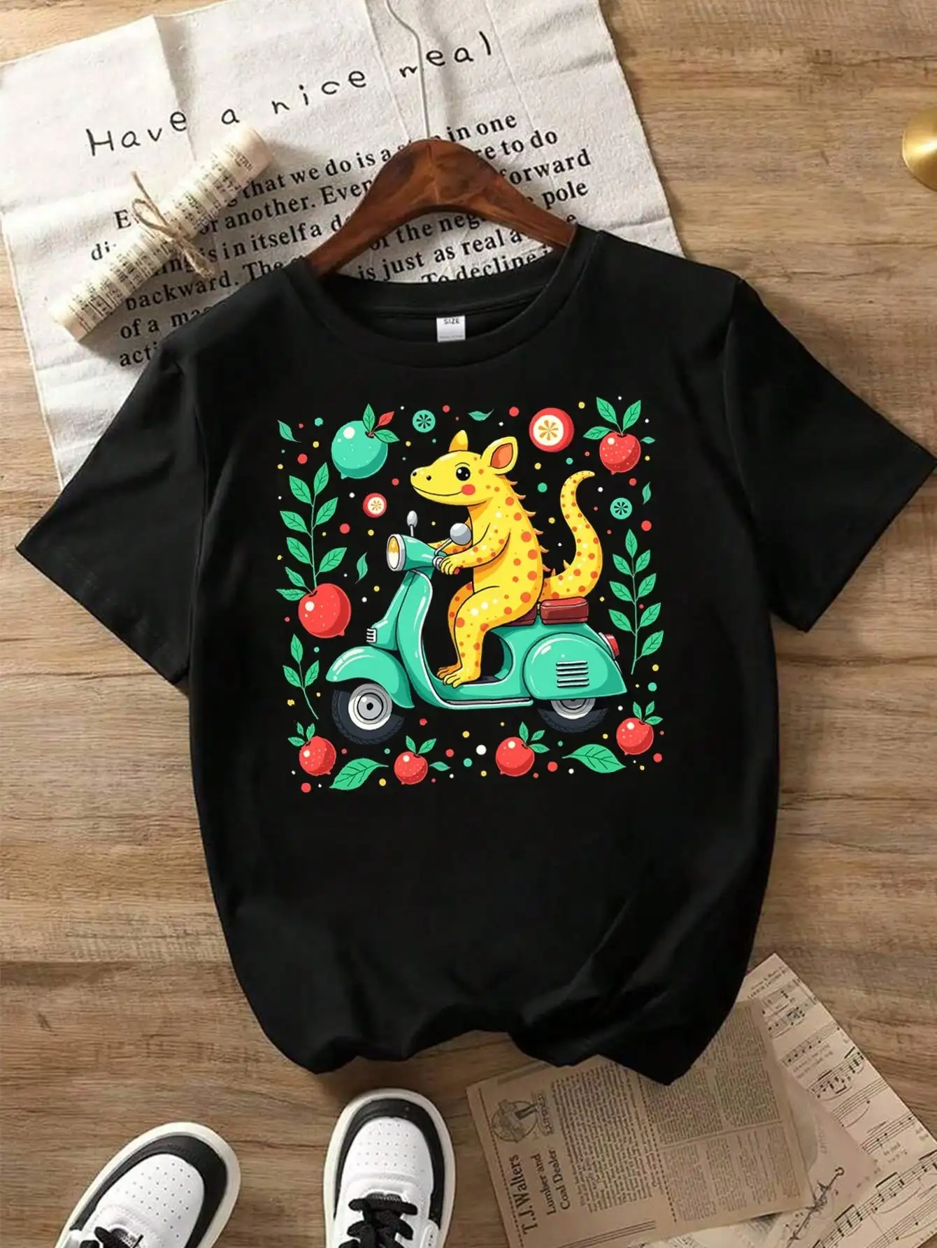 

Cute Mexican Axolotl Animal & Nature Pattern Cotton T-Shirt, Black Tee With Scooter, Animal & Fruit Elements