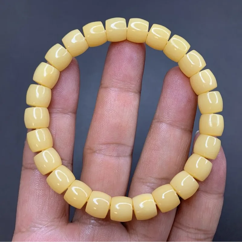 Tibetan-style old yellow - single strand. 9*8 straight-cut extreme curve bracelet. Camel bone