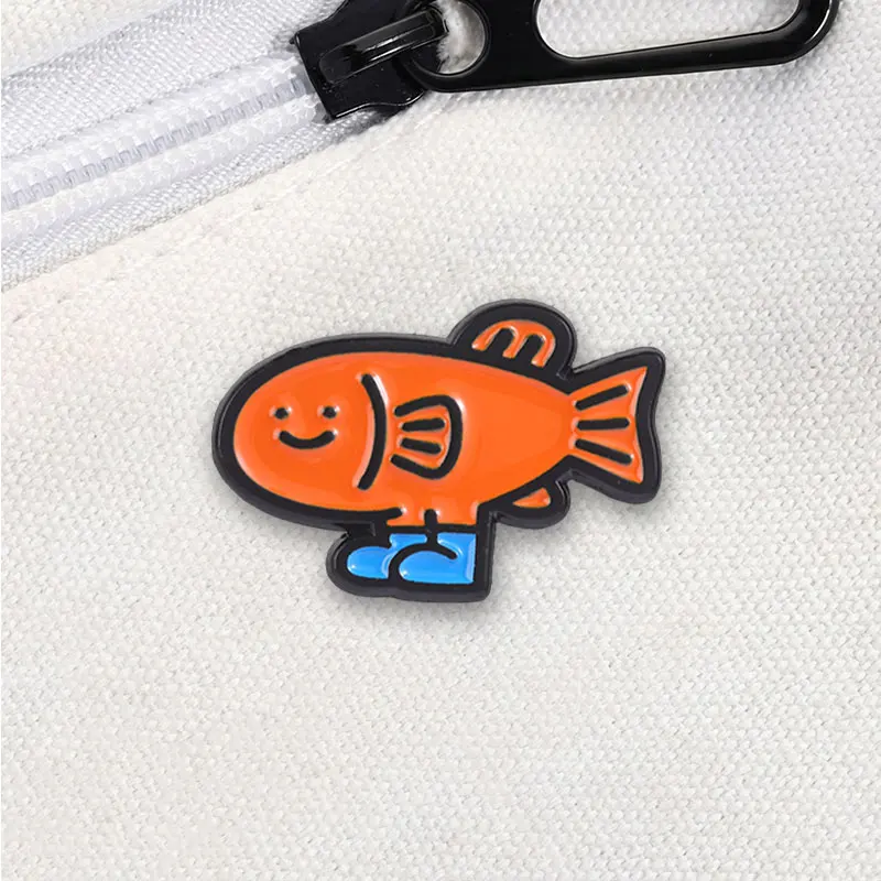 Funny Orange Fish Wearing Blue Shoes and Smiling Face Enamel Pins Cartoon Cute Walking Fish Metal Brooch Bag Lapel Badge Jewelry