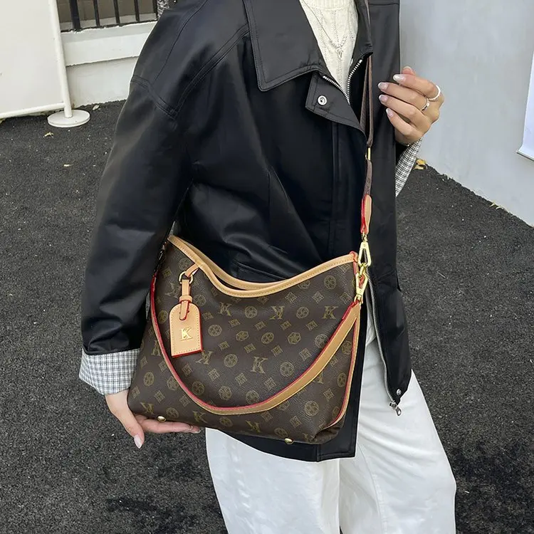 

Классическая парижская кожаная сумка для женщин, роскошная дизайнерская сумка через плечо, большая вместительная сумка для подгузников, элегантная, минималистичная, шикарная, для повседневного использования.