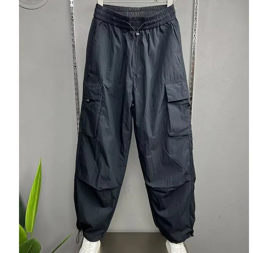 Calça de perna reta masculina fina e respirável, casual jovem, cor larga e sólida, bolsos grandes, calça de trabalho elegante, verão