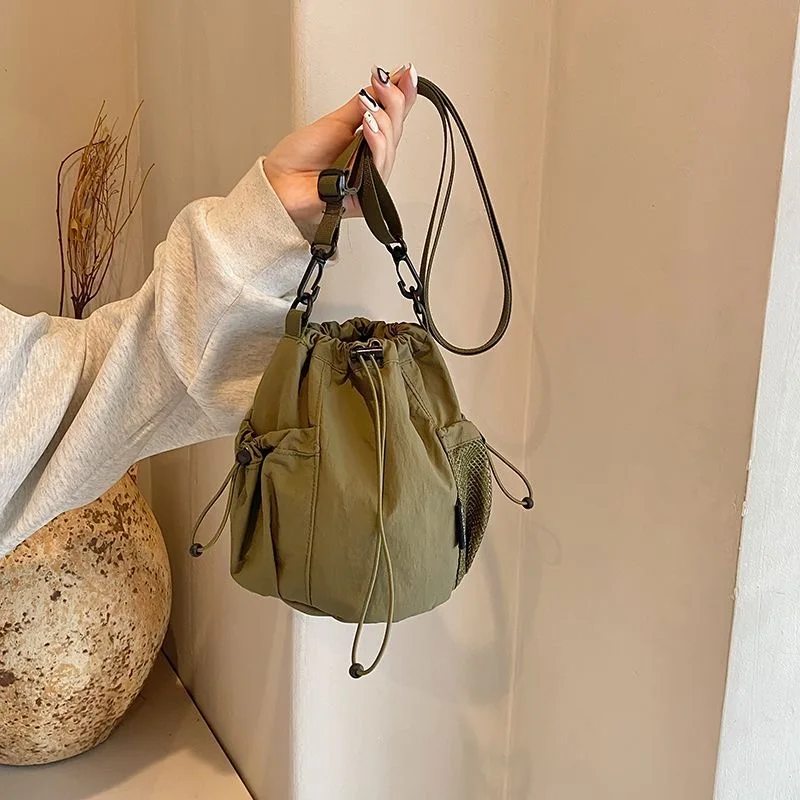 

Повседневная сумка-ведро Dstring, пригородная модная корейская сумка через плечо на одно плечо, сумка для телефона, нейлоновый материал, цвет