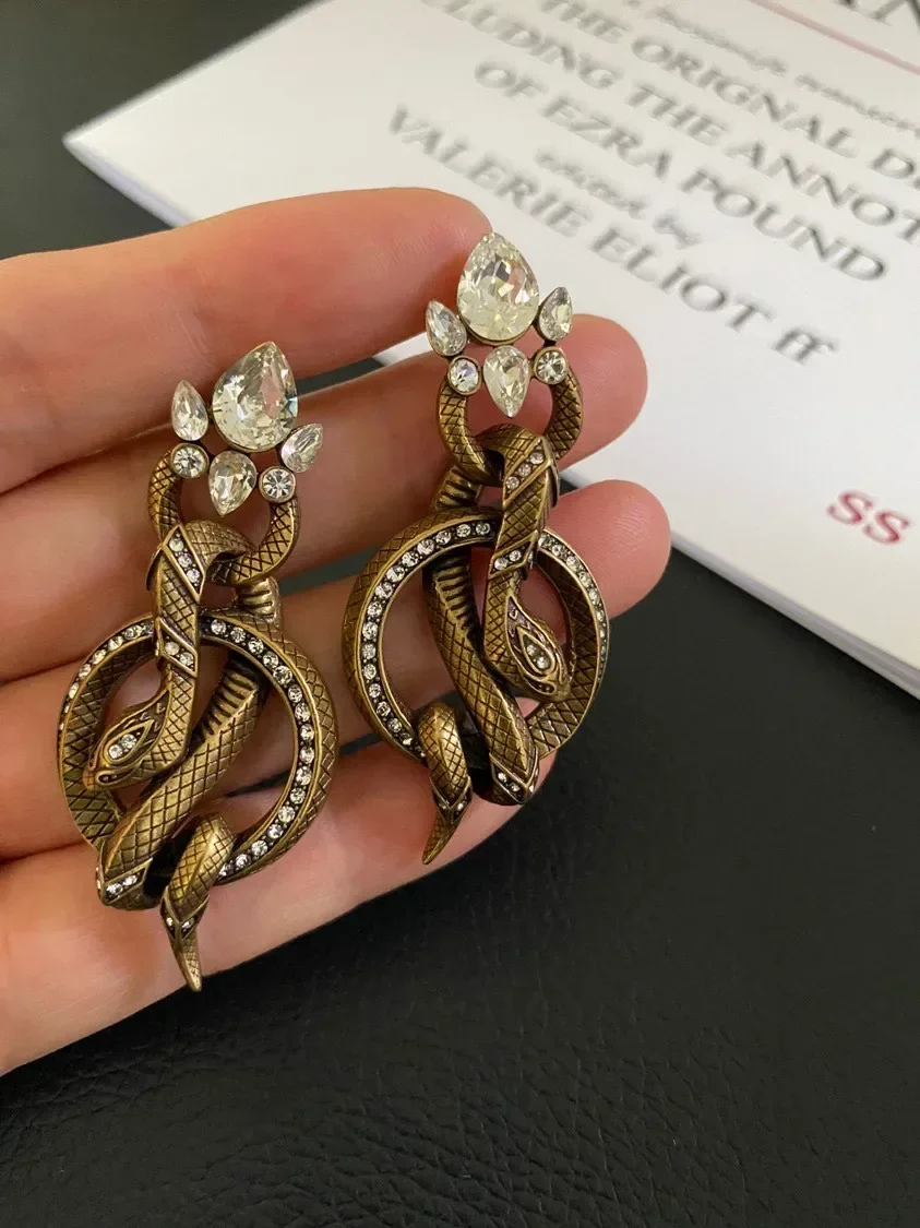 

Trendy personality brass retro snake winding earrings