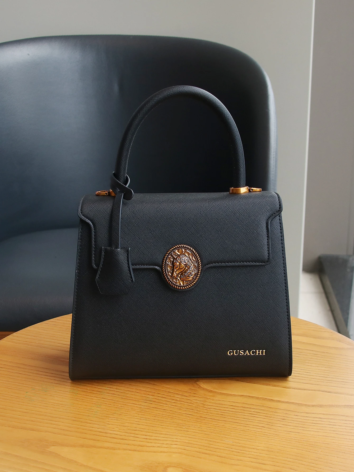 Modische neue Damenhandtaschen 2026 mit hohem Stilgefühl, Kong Quelan-förmige Handtasche mit Retro-Hardware, Joker-Handflächenmuster-Textur. – Detail 6