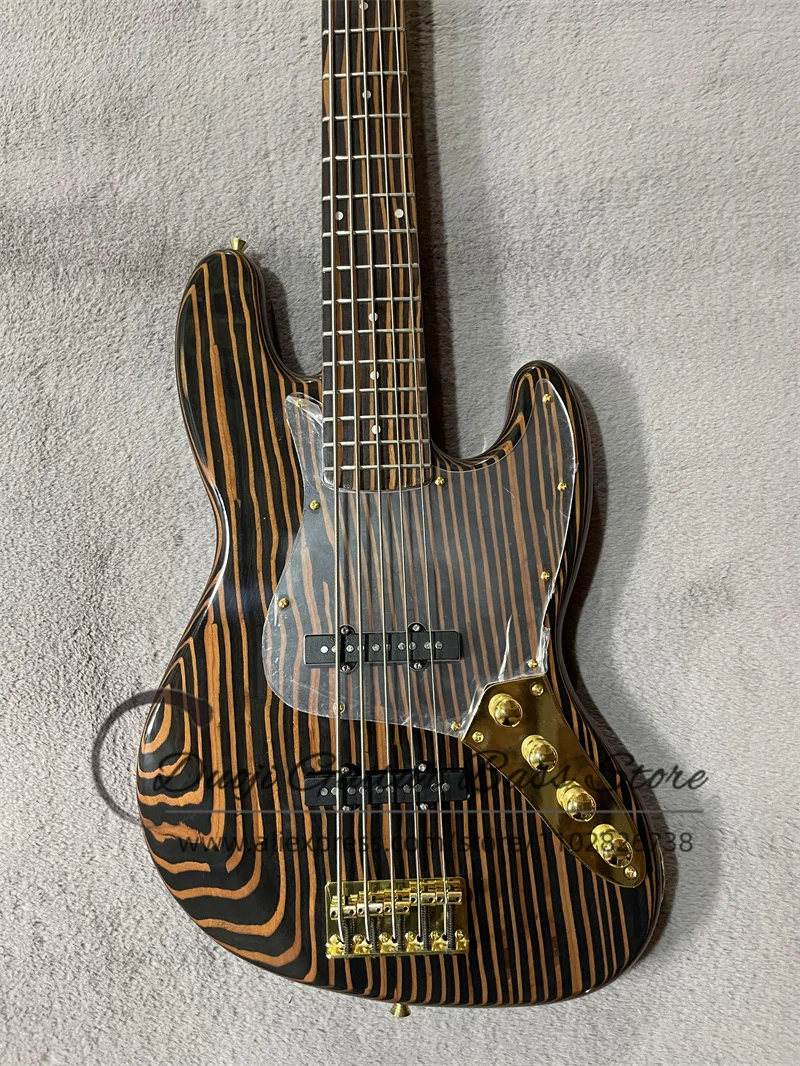 5 string Electric Bass Zebra Wood Body Zebra Wood Neck Acrylic Pickupguard Fixed Bridge Chrome Button Active Battery