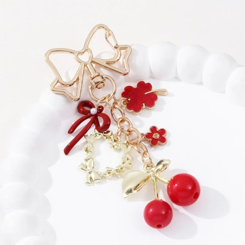 LLavero esmaltado de trébol y corazón de mariposa, flor de cerezo rosa y rojo, llavero encantador de fruta y planta para mujeres y niñas, joyería hecha a mano, 1 ud.