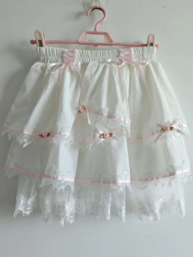 Mini jupes mignonnes pour filles douces, garniture en dentelle, décoration de nœud, taille élastique, short de style Lolita, vêtements Kawaii, été