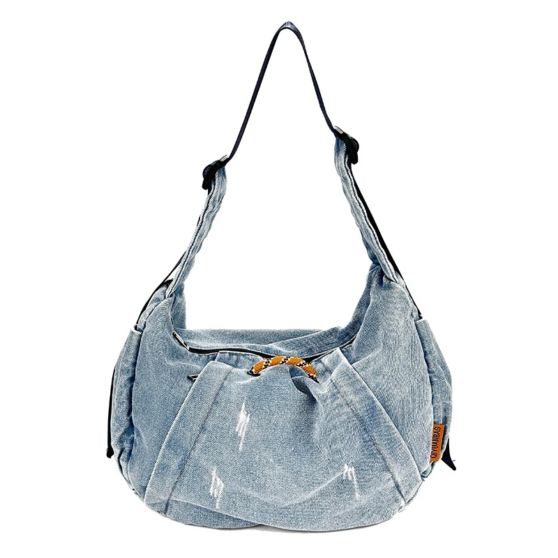

American retro washed denim dumpling bag for women2026New versatile commuter shoulder and crossbody bag for students attending c