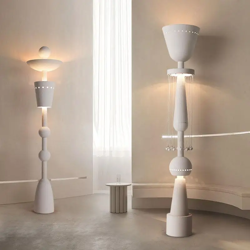 

Modern vintage cream white sculptural floor lamp E27 base is minimalist
