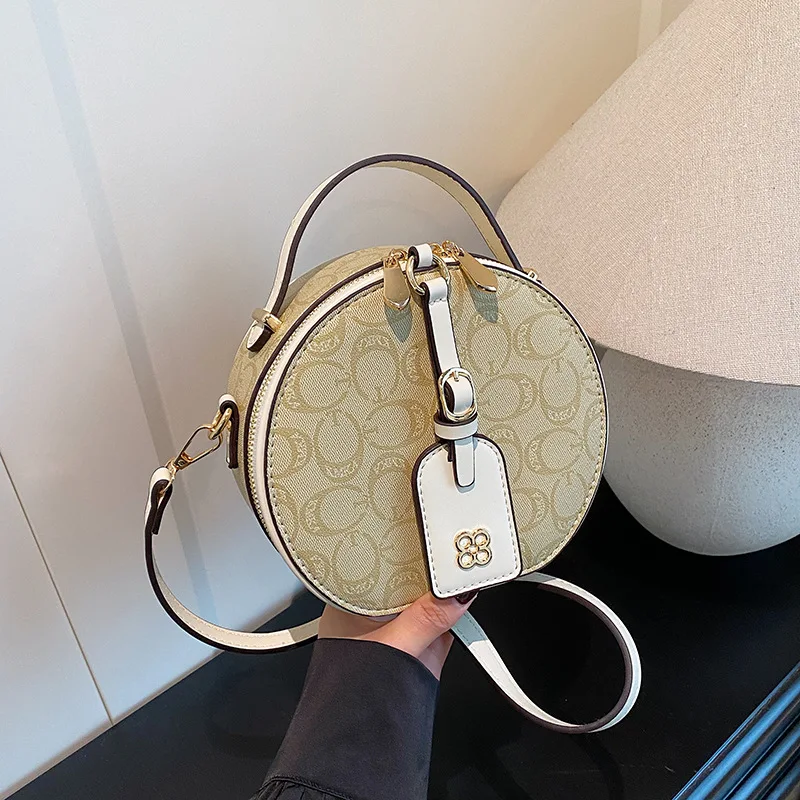 

‌SS25 Women's Designer Printed Mini Round Bag Retro Top Handle Convertible Crossbody Sophisticated Purse