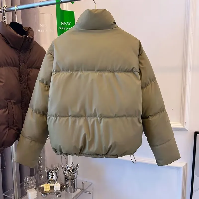 Winter Frauen Kurze Puffer Jacke 2025, Neue Stehkragen Parkas Weibliche Beiläufige Lose Warme Qulited Mantel Zipper Langarm Mantel