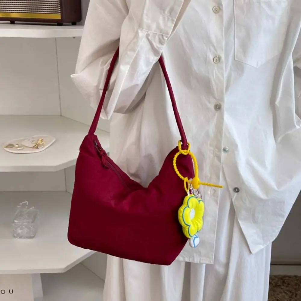 

Korean Style Solid Color Hand Bag Dumplings Bag with Flower Pendant Light Soft Nylon Bag Zipper Tote Bag Shoulder Bag Outdoor