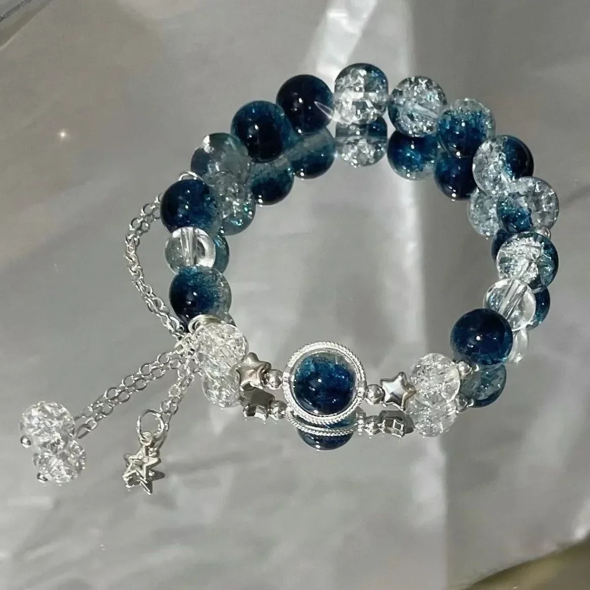 Pulsera con borlas y cadena de estrella para mujer, diseño de nicho, cuentas de cristal azul de fantasía, pulsera de cuerda elástica, regalos de joyería para mejores amigos