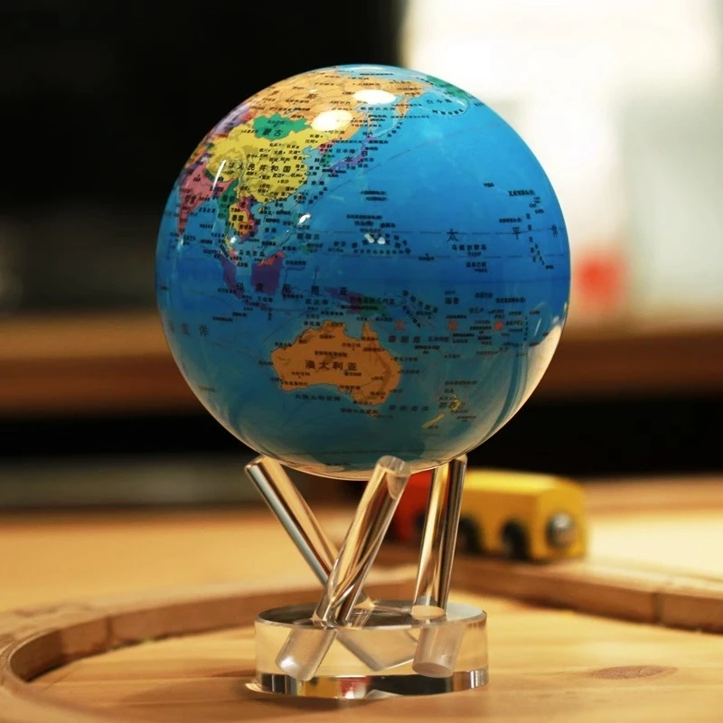The globe opens and gives gifts of decorative ornaments. Light energy is always moving, and the rotating maglev satellite