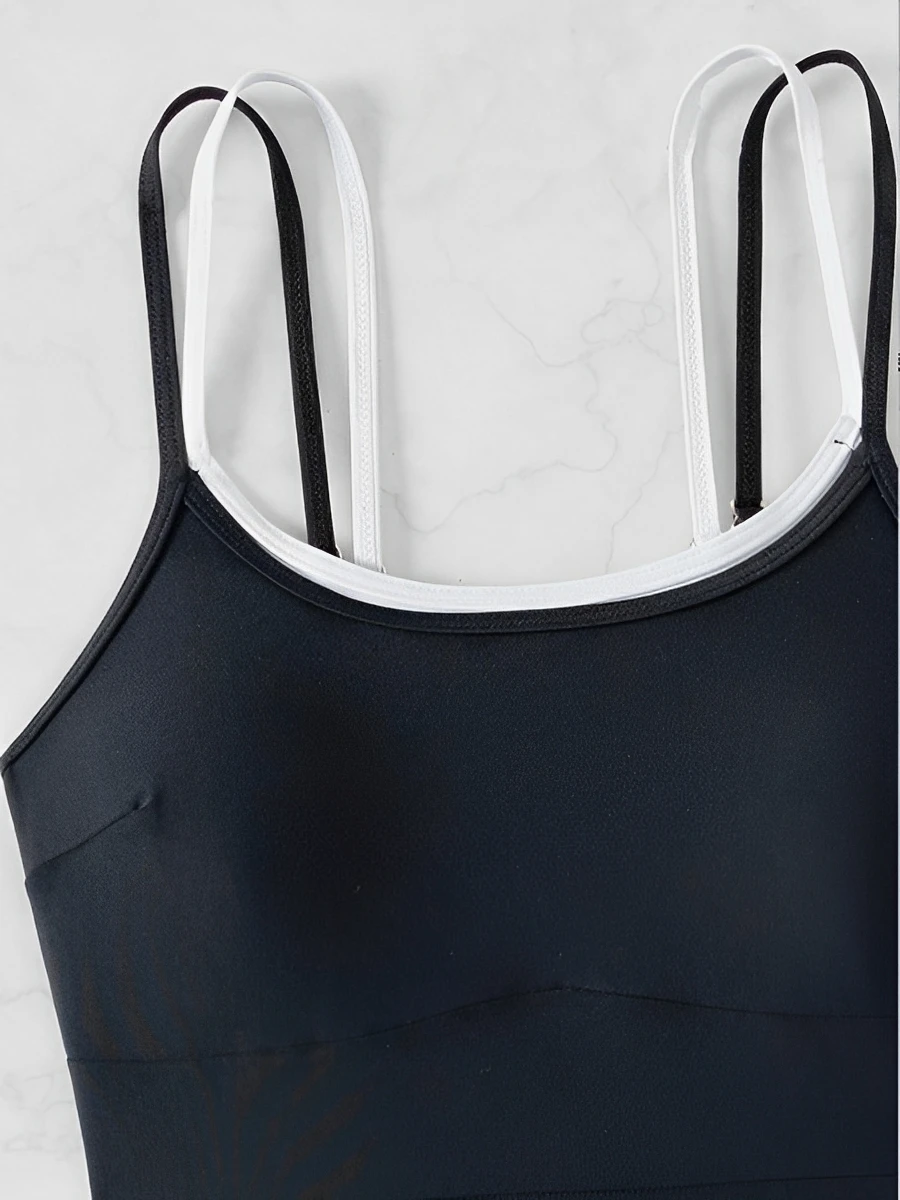 2025 Traje de baño sexy de tiras Traje de baño negro de una pieza Bañistas sólidos femeninos Traje de baño Traje de baño Ropa de playa