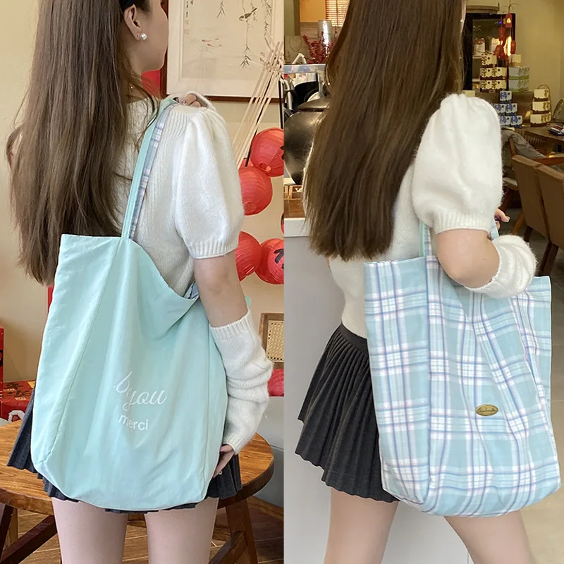 

2025 new small fresh shoulder bag, large capacity tote bag, simple double-sided dual-use women's handbag