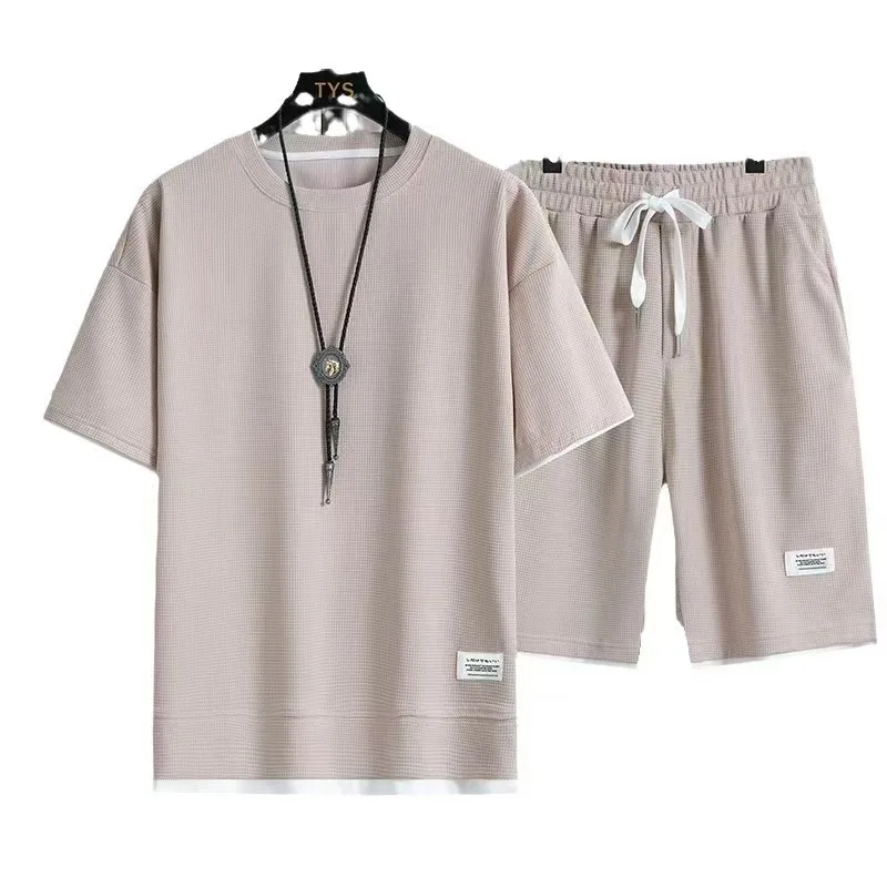 ชุดเซ็ตลำลองสปอร์ตสำหรับผู้ชาย เสื้อยืดแขนสั้นระบายอากาศแฟชั่นหล่อเท่ห์ + กางเกงขาสั้นกีฬา ชุดลำลองสำหรับผู้ชาย