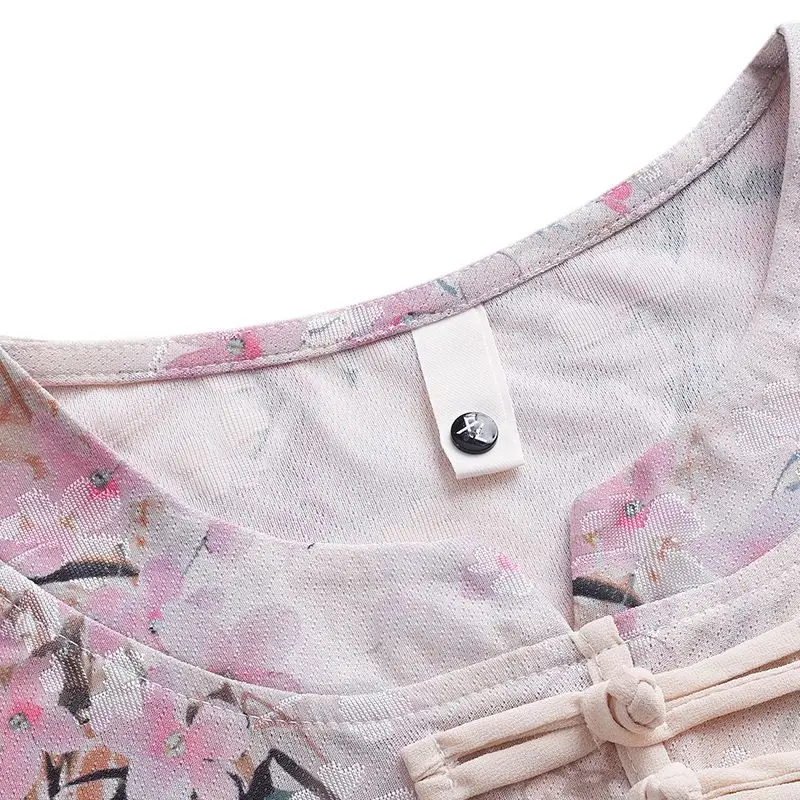 Damska koszulka z krótkim rękawem w nowym stylu, łączona, z okrągłym dekoltem, zapinana na guziki, modna, z nadrukiem, nowy chiński top