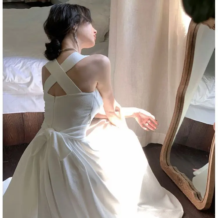 Abiti con bretelle bianche con cinturino incrociato Abito estivo sottile a vita alta da donna Temperamento Abiti eleganti con scollo a vento delicato