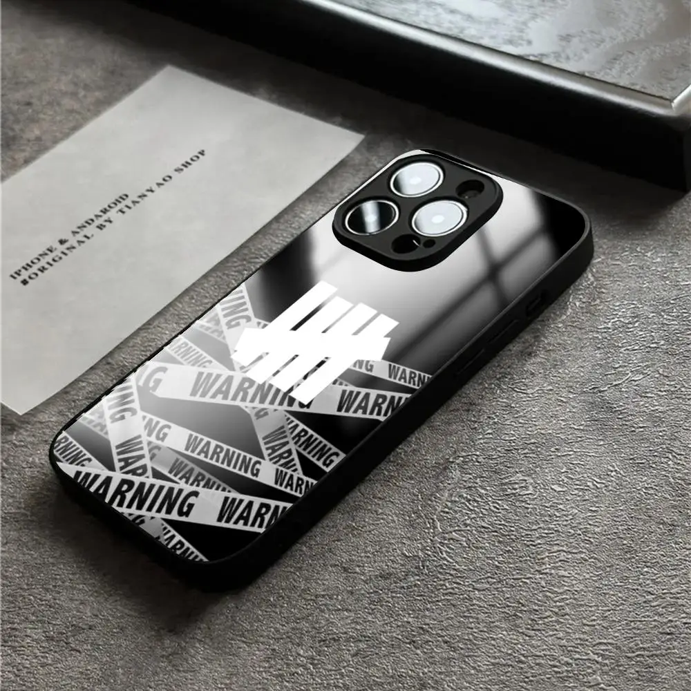 Fashion cool Undefeated logo hip-hop Phone Case For iPhone17 Air 16 e 15 14 13 12 11 Plus Mini Pro Max Glass Magnetic Case view 4