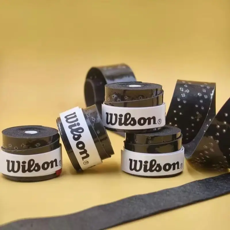 Wilson 12 ชิ้นแร็กเก็ต Sweatband Overgrip เทนนิสแบดมินตันการฝึกอบรมเหงื่อดูดซับมือกาวเทนนิสอุปกรณ์เสริม PU Non Slip Grip