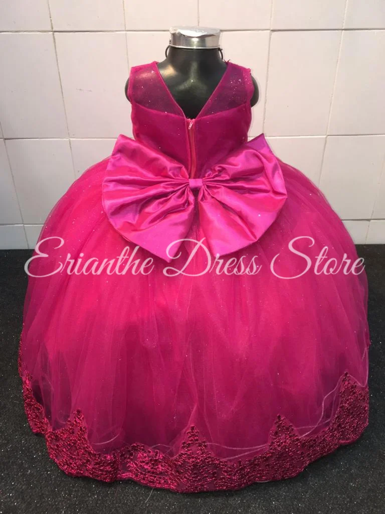 Sukienka dla dziewczynki na wesele w kolorze różowego różu, tiulowa, z aplikacjami i kokardą, na urodziny dziecka, Pierwszą Komunię Świętą, suknie balowe, szyta na miarę.