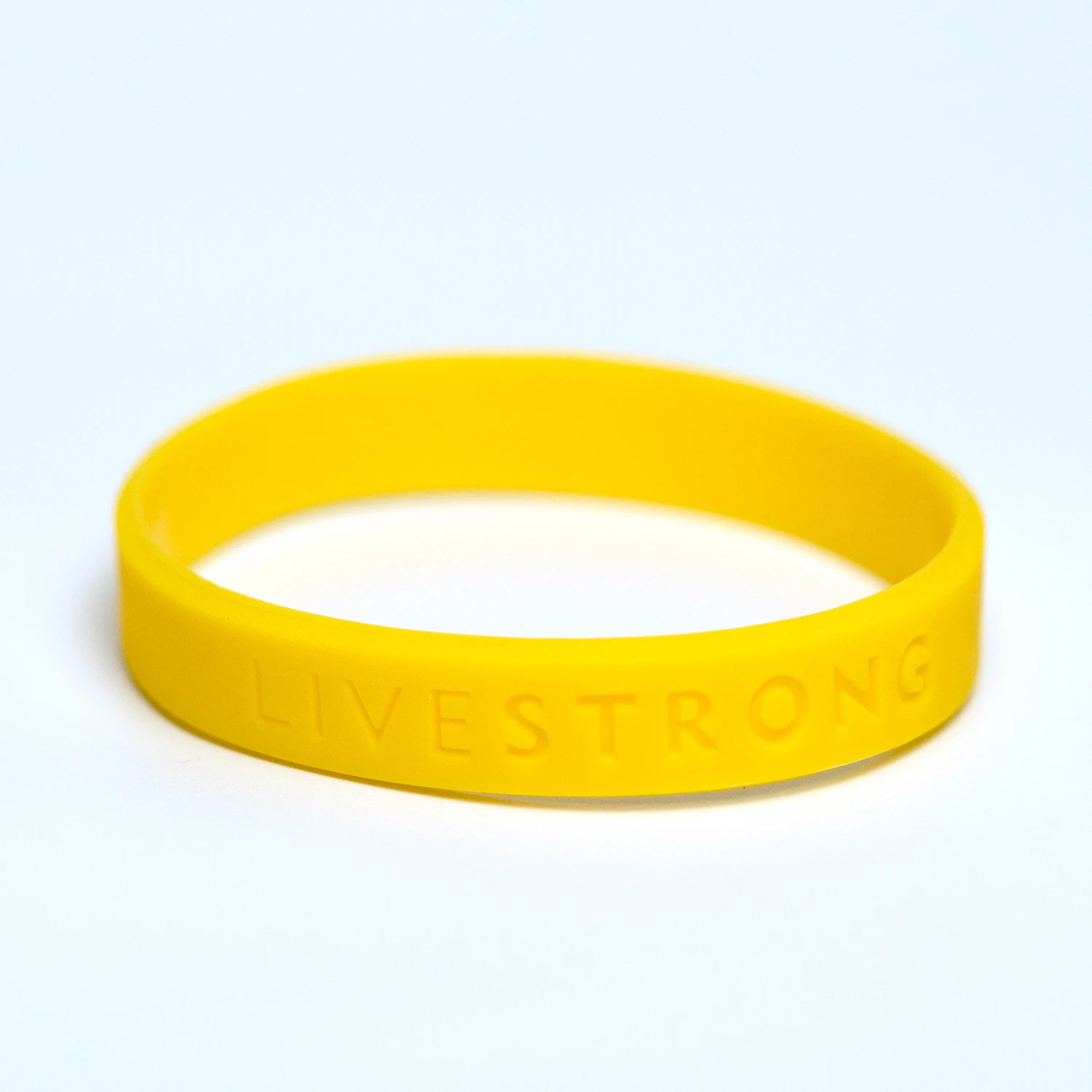 LiveStrong-pulsera deportiva de silicona con letras grabadas para hombre y mujer, banda de goma inspiradora, accesorios de animación, 1 piezas