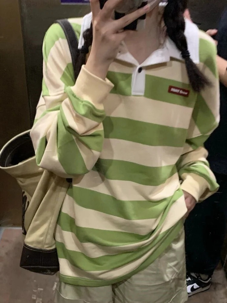 سترة نسائية كبيرة الحجم للربيع والخريف بياقة بولو رفيعة 2025 سترة فضفاضة جديدة على الطراز الأمريكي للطلاب #1